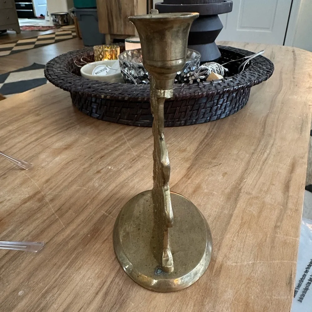 Elegant vintage brass Angel candle holder.  About 8”H Imperfection shown at base